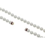 ALISSA - Here is a classic piece, enriched with a crystal rodhium studded magnet closing!
Jewel made of white pearl with crystal closing and ruby carrè stones. - A.Z. Bigiotterie