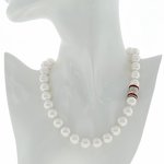 Rodhium and white pearl with crystal closing and ruby carrè stones