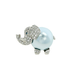TINO - TINO is a sweet and lovely brooch with the shape of a little elephant composed by rodhium with montana crystals and eyes, light blue pearl. - A.Z. Bigiotterie