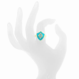 ISOLDE  2 - ISOLDE is a ring with regal tones, it is made of light gold with acquamarina crystals on turquoise enamel.

Size from 9 to 25. - A.Z. Bigiotterie