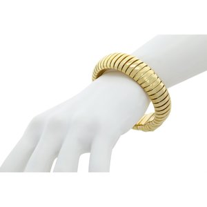 TUBE 2 - A semi rigid tube bracelet made of light gold, that wraps your wrist elegantly - A.Z. Bigiotterie