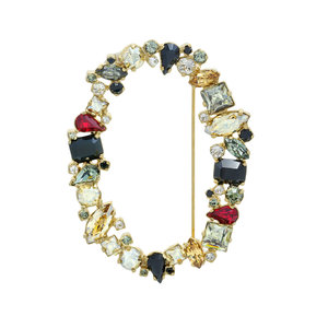 PRECIOUS OVAL - An oval of light! This brooch can highlight any look.
Jewel made of light gold and multicoloured stones. - A.Z. Bigiotterie