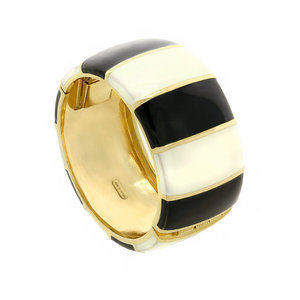 PERFECT CIRCLE - PERFECT CIRCLE is a rigid bracelet in light gold with white and black enamels,: a lively bangle that can revive any kind of outfit! - A.Z. Bigiotterie
