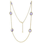 Light gold and tanzanite stone