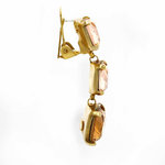 HOLLYWOOD - Questo luminoso e meraviglioso orecchino &egrave; perfetto per una serata speciale, che ti far&agrave; brillare come una star di Hollywood! &Egrave; un gioiello realizzato in oro chiaro con pendenti light peach e light smoked topaz. - A.Z. Bigiotterie