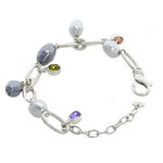 Rodhium with tanzanite, vintage rose, olivine stones and light and dark grey pearls